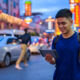 Portrait,Of,Young,Handsome,Asian,Tourist,Man,Exploring,At,Chinatown